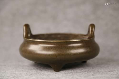 A QING DYNASTY DAOGUANG 27TH YEAR SOARING EARS TRIPOD BRONZE...