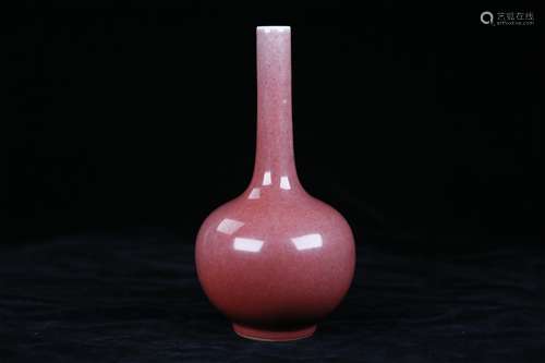 A COWPEA RED GLOBULAR SHAPE VASE