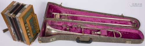 An accordeon and trombone, 20th century.