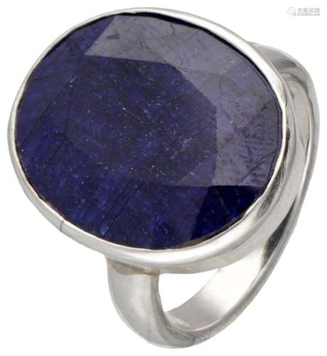 Sterling silver solitaire ring set with sapphire.