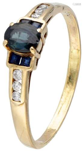 14K. Yellow gold ring set with natural sapphire and zirconia...