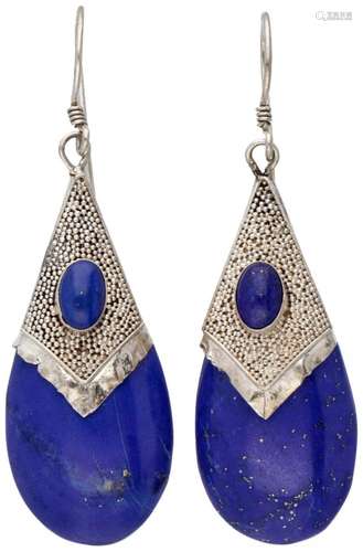 Sterling silver earrings set with lapis lazuli.