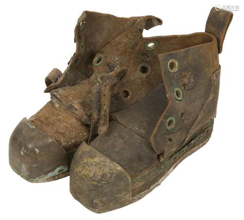 A lot comprising (2) iron deep sea diving shoes, 20th centur...