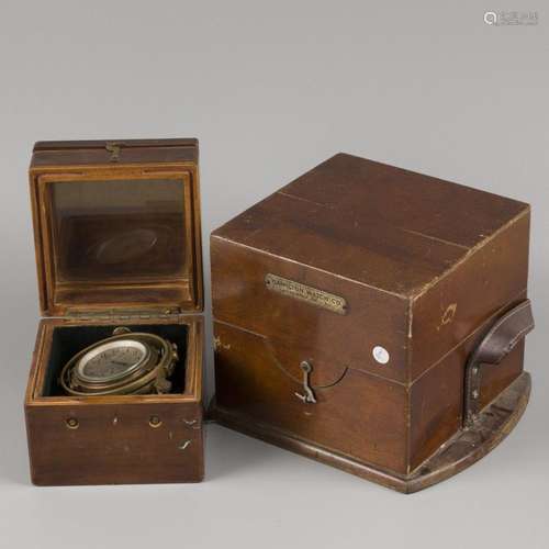 A "Hamilton Watch Co." chronometer in a wood case,...