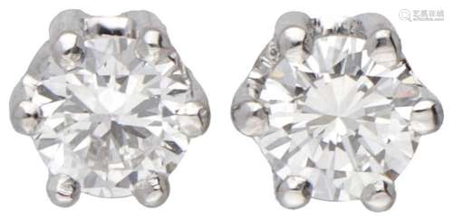 14K. White gold solitaire earrings set with approx. 0.40 ct....