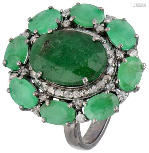 Sterling silver ring set with emerald and diamond.