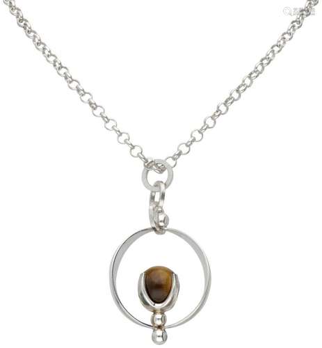 Silver necklace with a tiger eye pendant by Finnish designer...