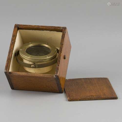 A brass ships compass, 20th century.