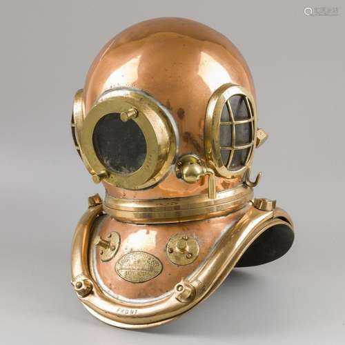 A copper and brass six bolt diving helmet by Siebe Groman Co...