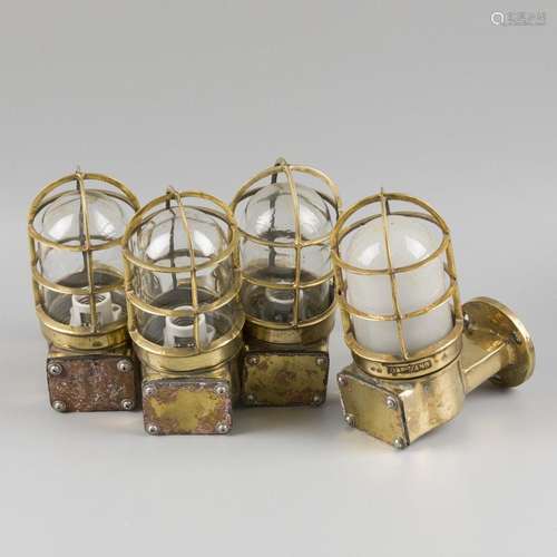 A lot with (4) brass maritime wall lamps with porcelain fitt...