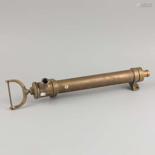 A brass handpump, England(?), 20th century.