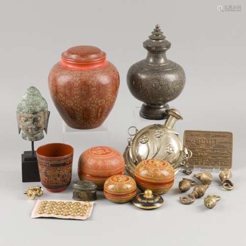 A lot comprising various items, a.w. a Buddha head and lidde...