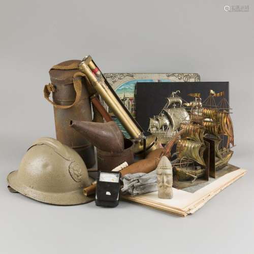 A lot comprising various items, a.w. a helmet and miniature ...
