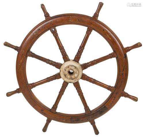 A wooden steering wheel originating from the flight deck, 20...