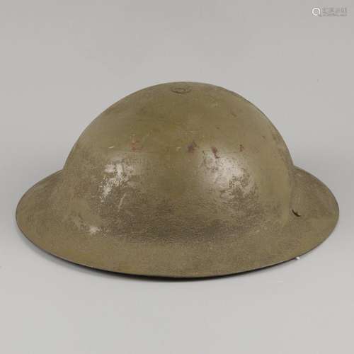 A "Brodie" helmet from WWII, England, 1st half 20t...