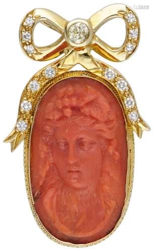 14K. Yellow gold pendant set with a red coral cameo and appr...