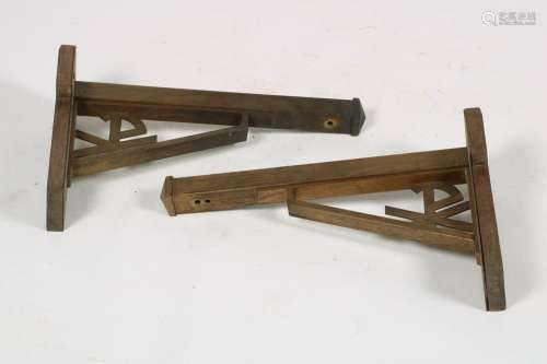 Two brass wall corbels, Pax Christi, mid. 20th century.