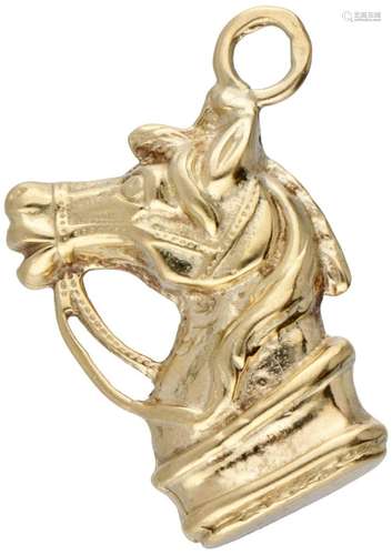 14K. Yellow gold vintage pendant in the shape of a horse...