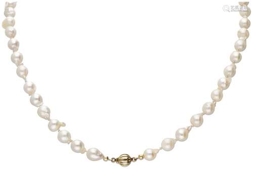 Freshwater pearl necklace with a 14K. yellow gold closure.