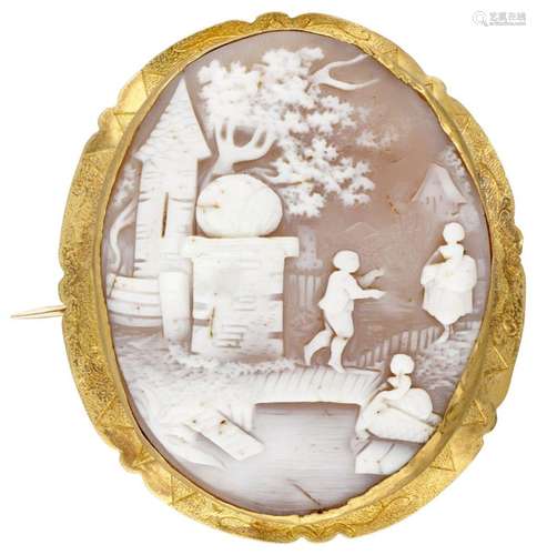 14K. Yellow gold brooch set with a cameo.