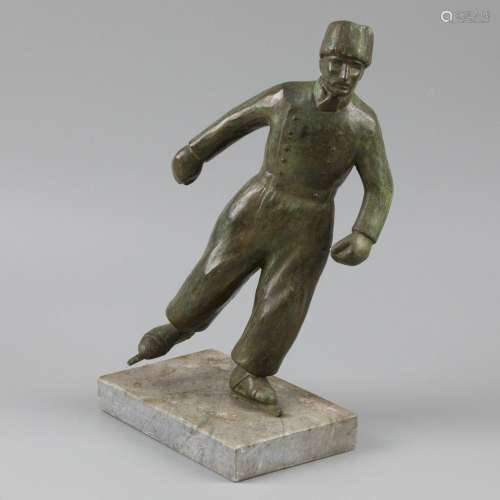 A bronze statuette of a fisherman from Volendam on skates.