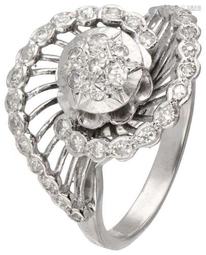 18K. White gold openwork entourage ring set with approx. 0.2...