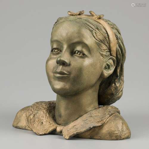 A gold patinated bust of a young girl, France, ca. 1920/1930...