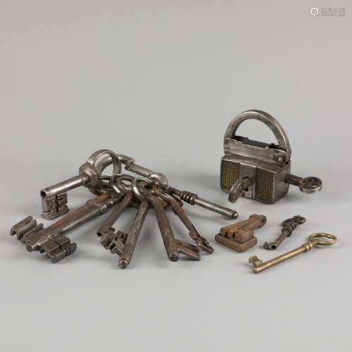 A lot comprising various iron keys with a barrel lock, 17th ...