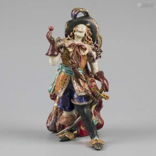 A porcelain figurine depicting Savinien de Cyrano de Bergera...