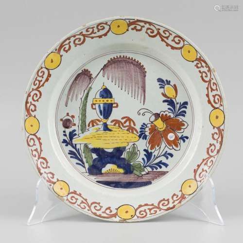 A Delft polychromed earthenware charger, Dutch, 18th century...