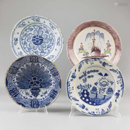 A lot of (4) earthenware dishes with various decorations. De...