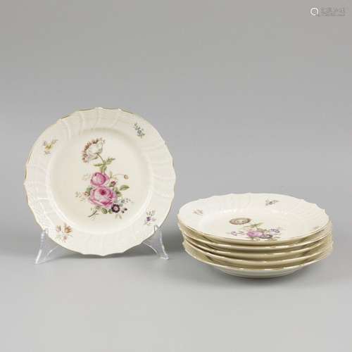 A set of (6) porcelain plates decorated with flowers, marked...