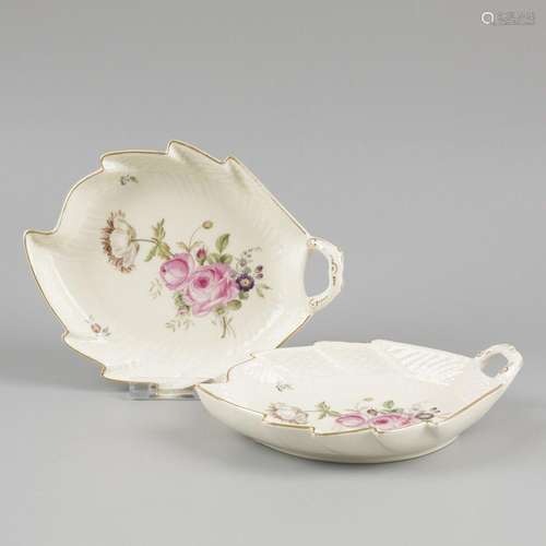 A set of (2) porcelain serving dishes decorated with flowers...