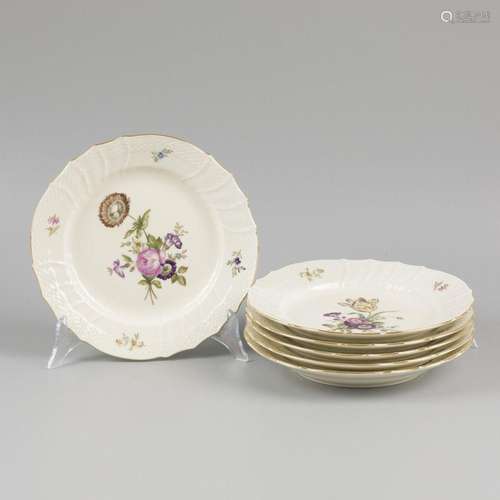 A set of (6) porcelain plates decorated with flowers, marked...