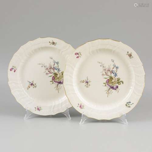 A set of (2) porcelain dishes decorated with flowers, marked...