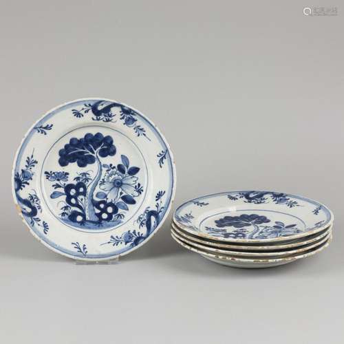 A set of (5) earthenware plates with decoration of trees and...