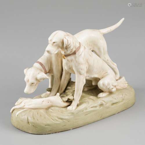 An earthenware group depicting two dogs with a hare in the g...