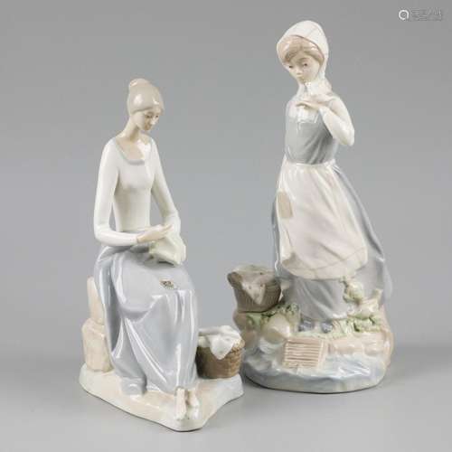 A lot comprising (2) porcelain figurines, laundry girl and s...