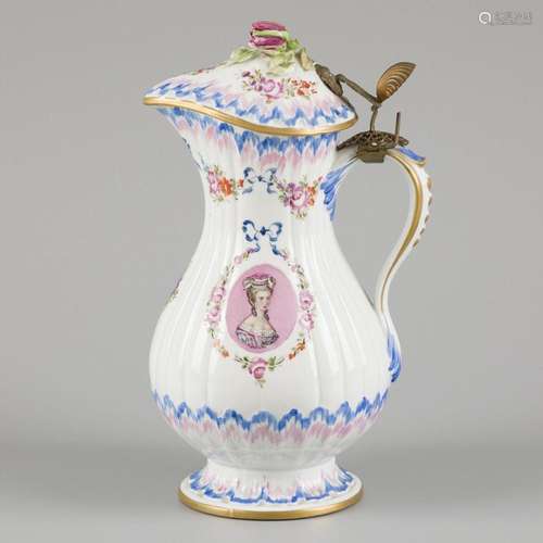 A porcelain lidded jug with decoration of flowers and a port...