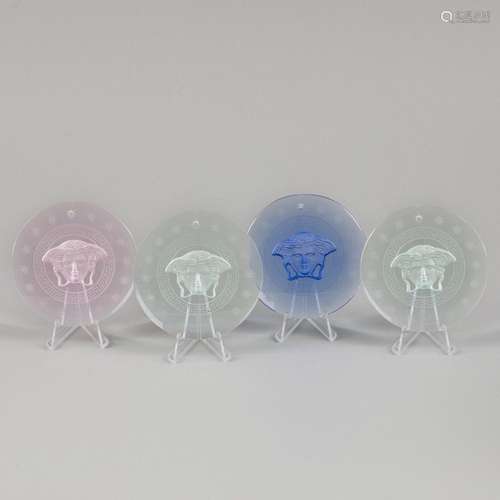 A lot of (4) glass Christmas ornaments decorated with a (cut...