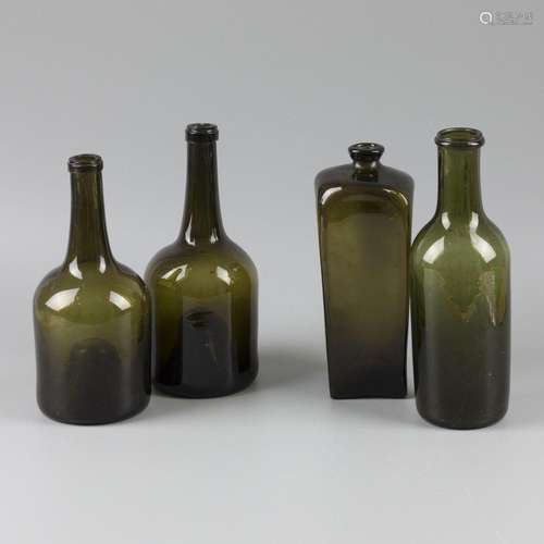 A lot comprising (4) various green glass bottles, Dutch, lat...