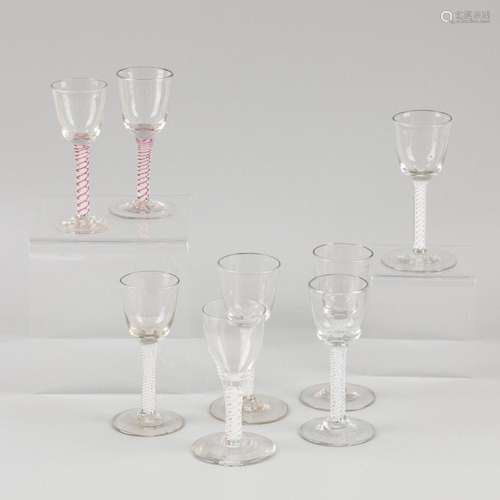 An (8) piece lot twist spiral stem glasses a.w. two with red...