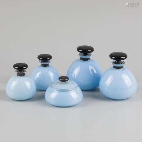 A (5) piece art deco style toiletry set, sky blue glass with...