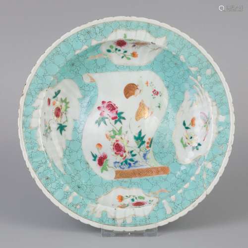 A porcelain Famille Rose deep plate with rising soul. China ...