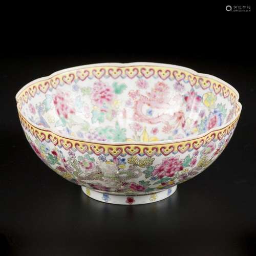 A porcelain eggshell lobed bowl with dragon decor. China, 19...