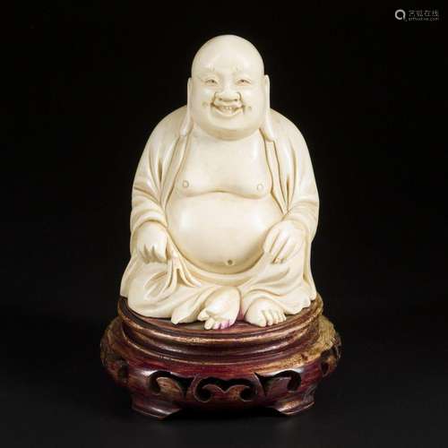 An ivory-sculpted Buddha on a wooden base. China, late 19th ...