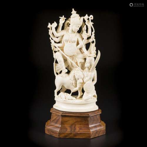 An ivory figurine of Shiva with a lion fighting evil, India,...