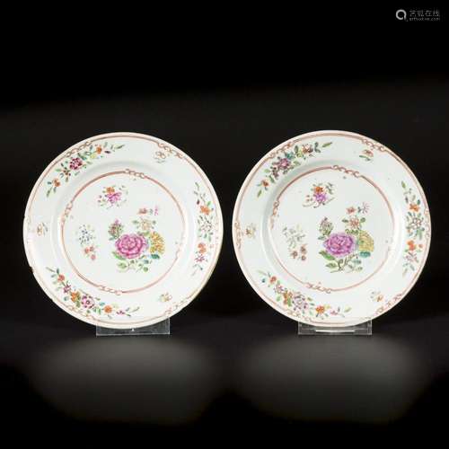 A set of (2) porcelain famille rose plates with floral decor...