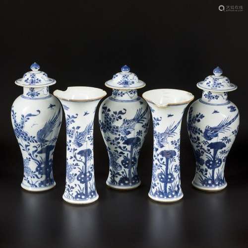 One (5) piece porcelain garniture set with floral decoration...