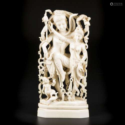 An ivory figurine of a dancing Shiva and Parvati as a couple...